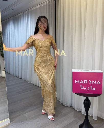 فستان ريلا (فستان ذهبي كلفه شك سهره راقيه)