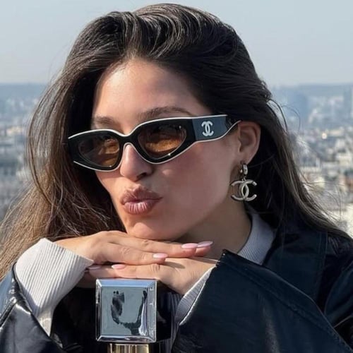 نظارة شانيل Cat Eye باللون الابيض والاسود وعدسة بن...