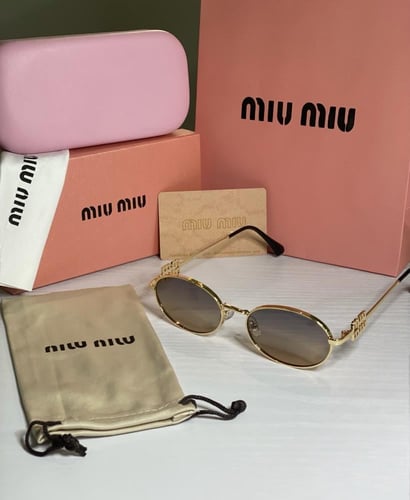 نظارة mيو ميو باللون الذهبي