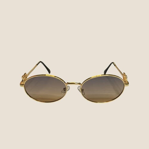 نظارة mيو ميو باللون الذهبي