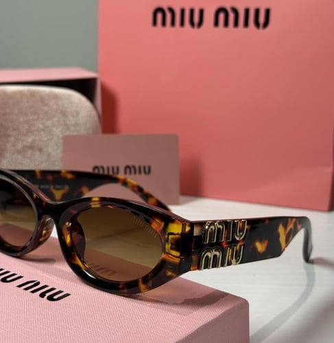 نظارة ميو ميو باللون التايقر