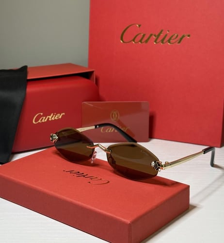 نظارة كارتير بعدسة هندسية بدون إطار باللون البني