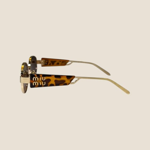 نظارة ميو ميو تايقر بعدسة بيضاوية باللون البني الم...