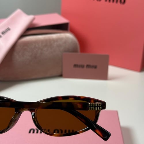 نظارة ميو ميو Line باللون التايقر وعدسة بني