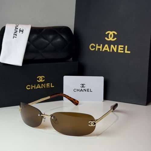 نظارة شانيل بدون إطار باللون الذهبي وعدسة بني