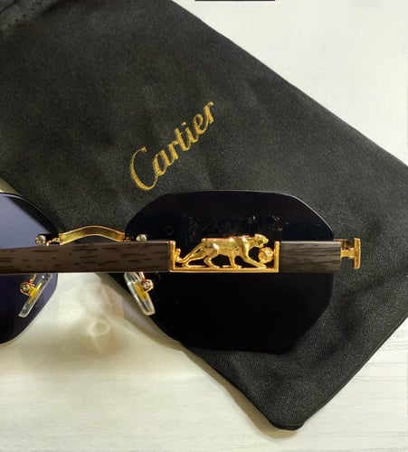 نظارة كارتير بدون إطار بذراع خشبي