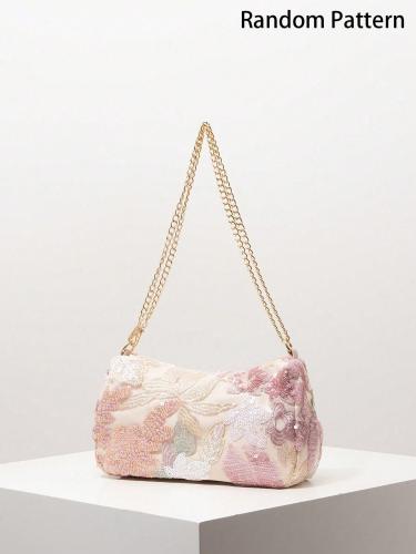 A shoulder bag decorated with sequins