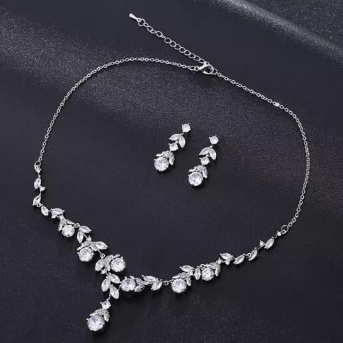 طقم مجوهرات نسائي بفصوص زركون – عقد، حلق، أساور، و...