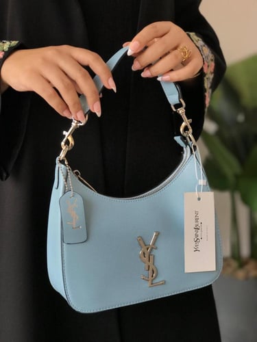 شنطة سان لوران فاخرة – تصميم أنيق وعصري لإطلالة يو...