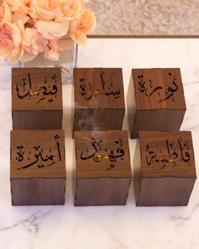 توزيعات مباخر خشب بالاسم