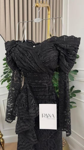 فستان أسود يطيل شكل القوام