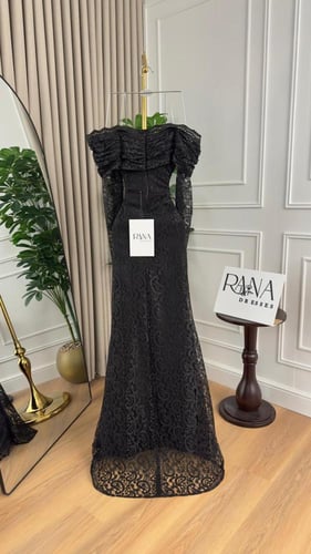 فستان أسود يطيل شكل القوام