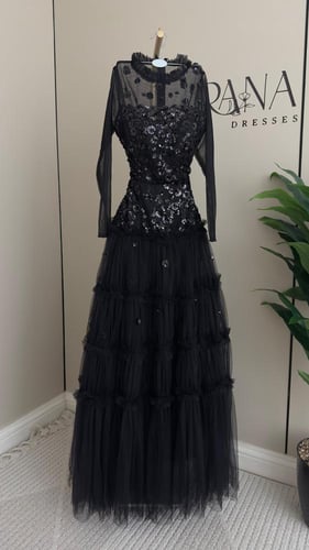 فستان سهره اسود فخم مزين بترتر واكمام شفافه