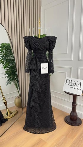 فستان أسود يطيل شكل القوام