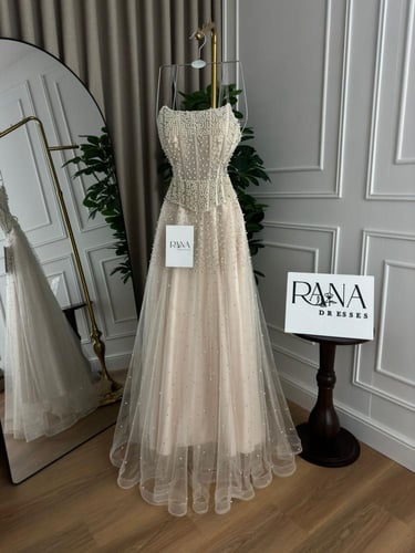 فستان لؤلؤي فخم بإطلالة راقية