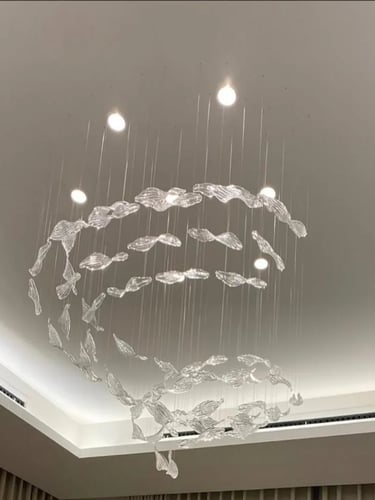Chandelier of transparent design leaves – simplici...