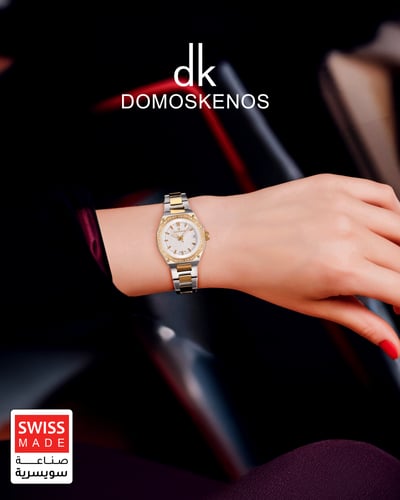 ساعة نسائية صناعة سويسرية ماركة دي كي فضي ذهبي مين...