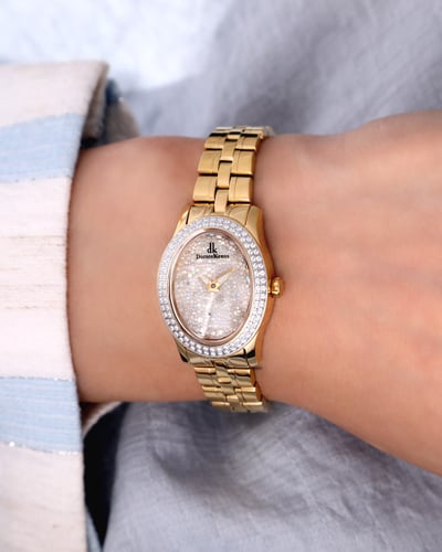 ساعة نسائية ماركة دي كي صناعة سويسرية ذهبي مينا زر...