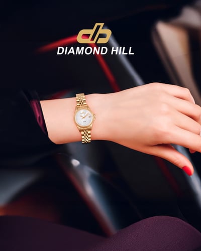 ساعة نسائية ماركة دايموند هيل موديل ذهبي مينا فضي...