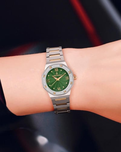 ساعة نسائية صناعة سويسرية ماركة دي كي فضي ذهبي مين...