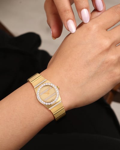 ساعة نسائية ماركة دي كي ذهبي DKGP2352