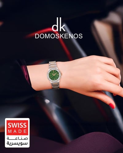 ساعة نسائية صناعة سويسرية ماركة دي كي فضي ذهبي مين...