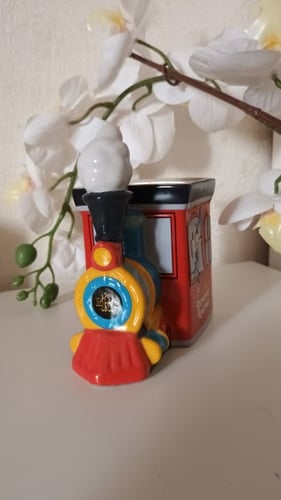 كوب القطار بشخصية بلوتو