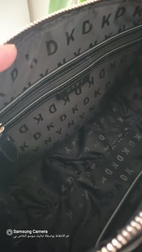 شنطة دكني حجم متوسط مائل للكبيى