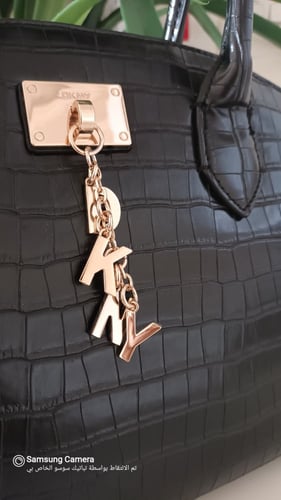 شنطة دكني حجم متوسط مائل للكبيى