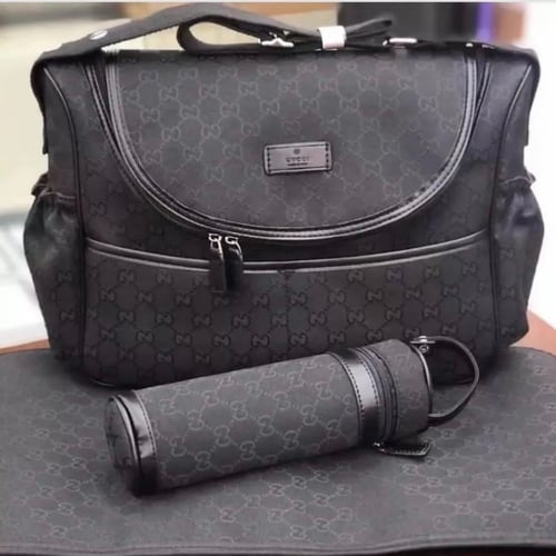 شنطة قوتشي للمواليد