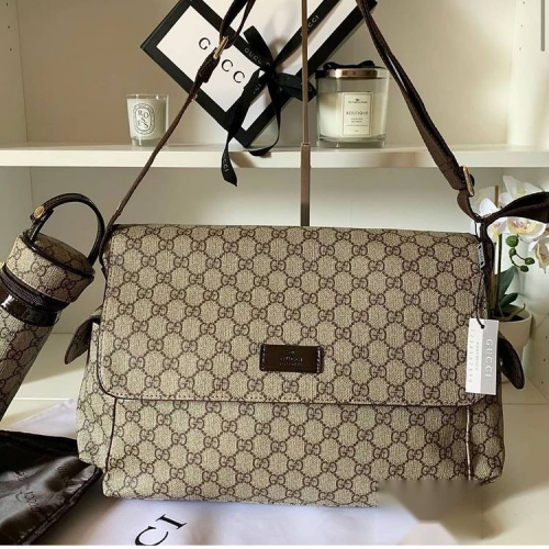 شنطة قوتشي للمواليد