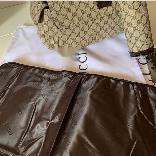 شنطة قوتشي للمواليد