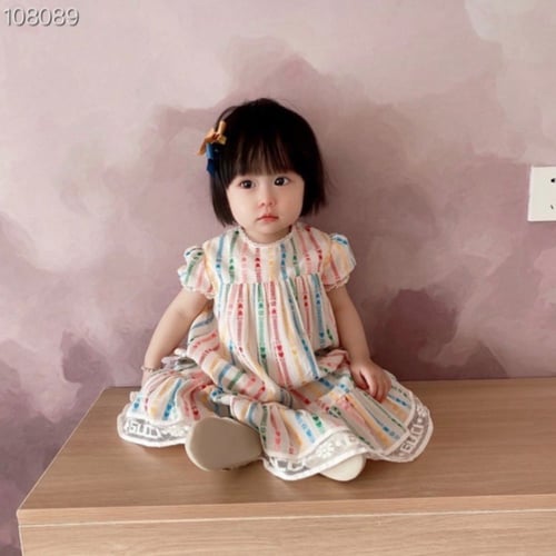 فستان قوتشي مطرز ملون