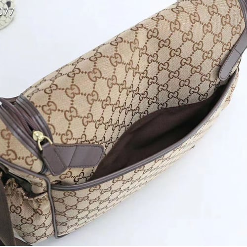 شنطة قوتشي للمواليد