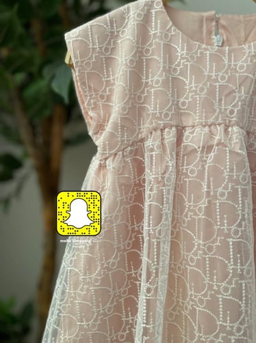 فستان ديور دانتيل مطرز