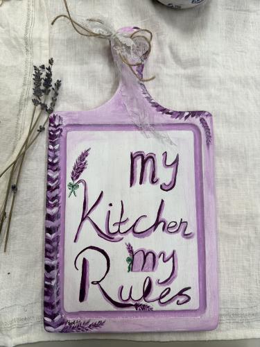 A board on a wooden cutting base lavender