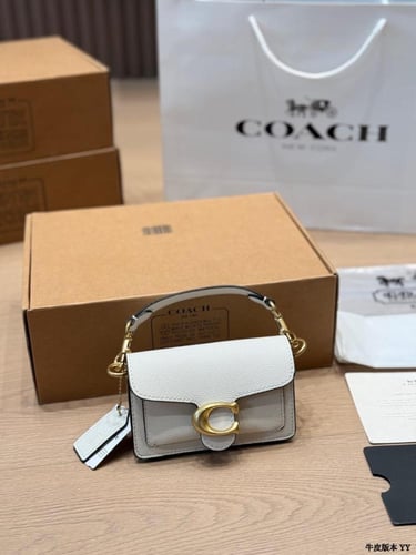 شنطة يد تابي من كوتش حجم ميني ماستر كواليتي