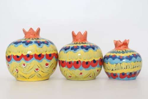 فازة على شكل رمان لون برتقالي