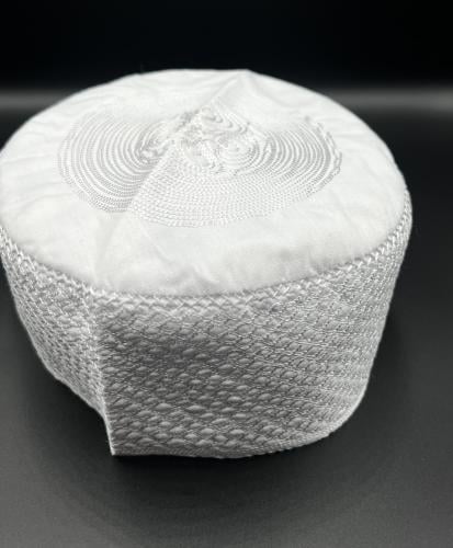 My kingly cap, made in Mecca Al-Mukarramah