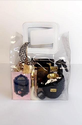 لمسات رمضانية فاخرة صندوق أنيق يضم مصحفًا، بخورًا،...