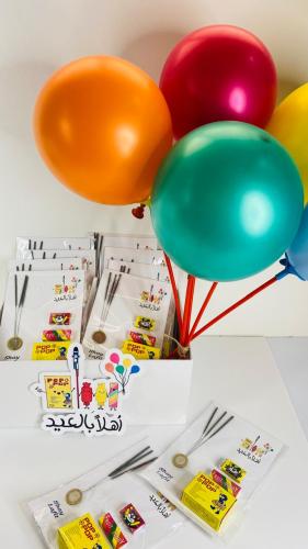 توزيعات العيد هدية أطفال مع بالونات وحلويات(24 حبه...