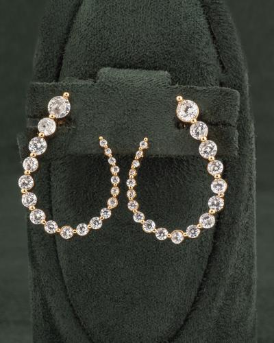 حلق ذهبي مزين بالزركون تصميم دائري