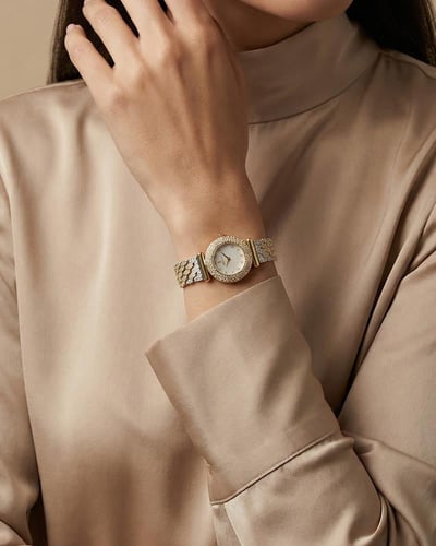 ساعة فاخرة للنساء من خاتون تصميم ذهبي فضي