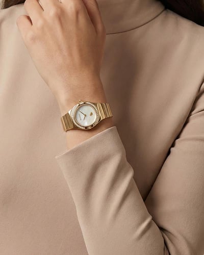 ساعة نسائية راقية من خاتون لون ذهبي مينا أبيض