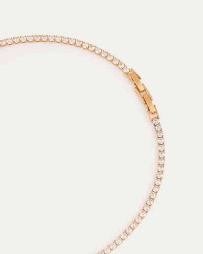 طقم تنس نسائي ذهبي من سلسال وحلق بلمعة الالماس