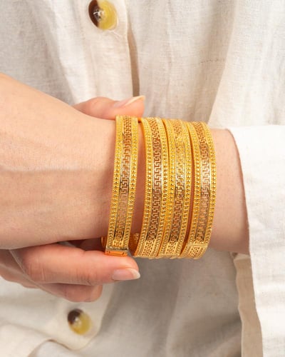 غوايش ذهبية دقة عريضة من خاتون - 2حبة