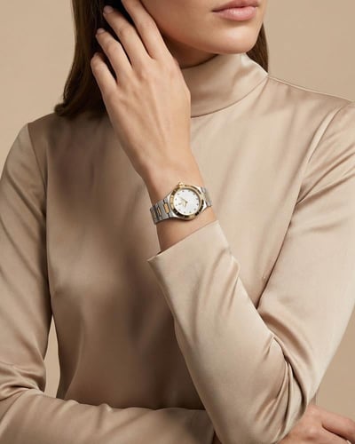 ساعة يد نسائية من خاتون تصميم ثنائي اللون