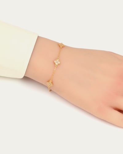 إسوارة الفلور الذهبية المرصعة بالزركون