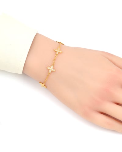 اسوارة نسائية ذهبية بتصميم الزهرة بلمعة الألماس