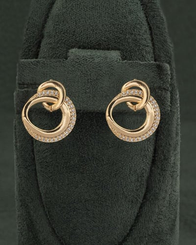 أقراط ذهبية بتصميم قطرة الندى المرصعة بالزركون الم...